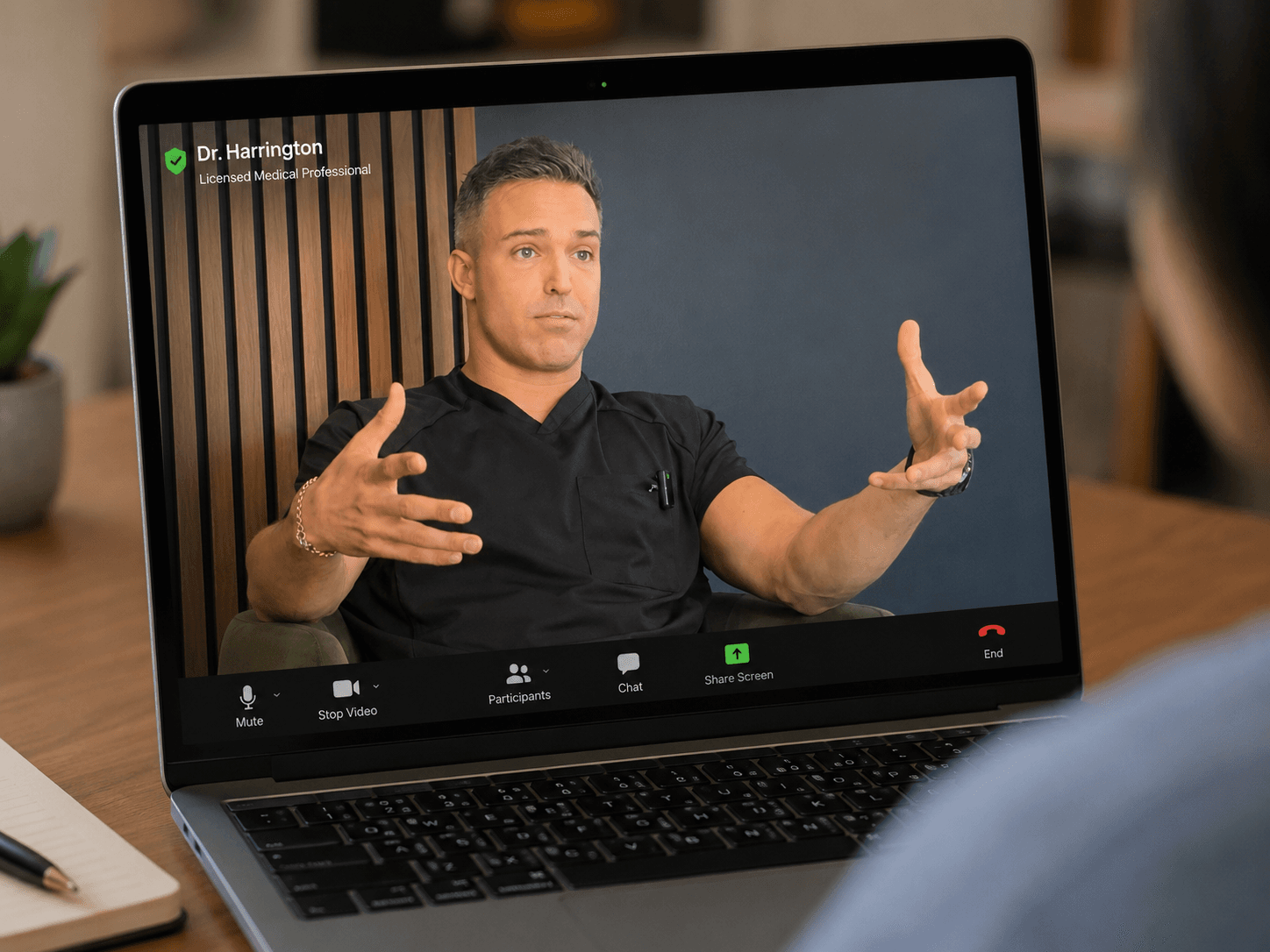 Dr. Michael Harrington on a video consultation — licensed medical professional, real face, real conversation.